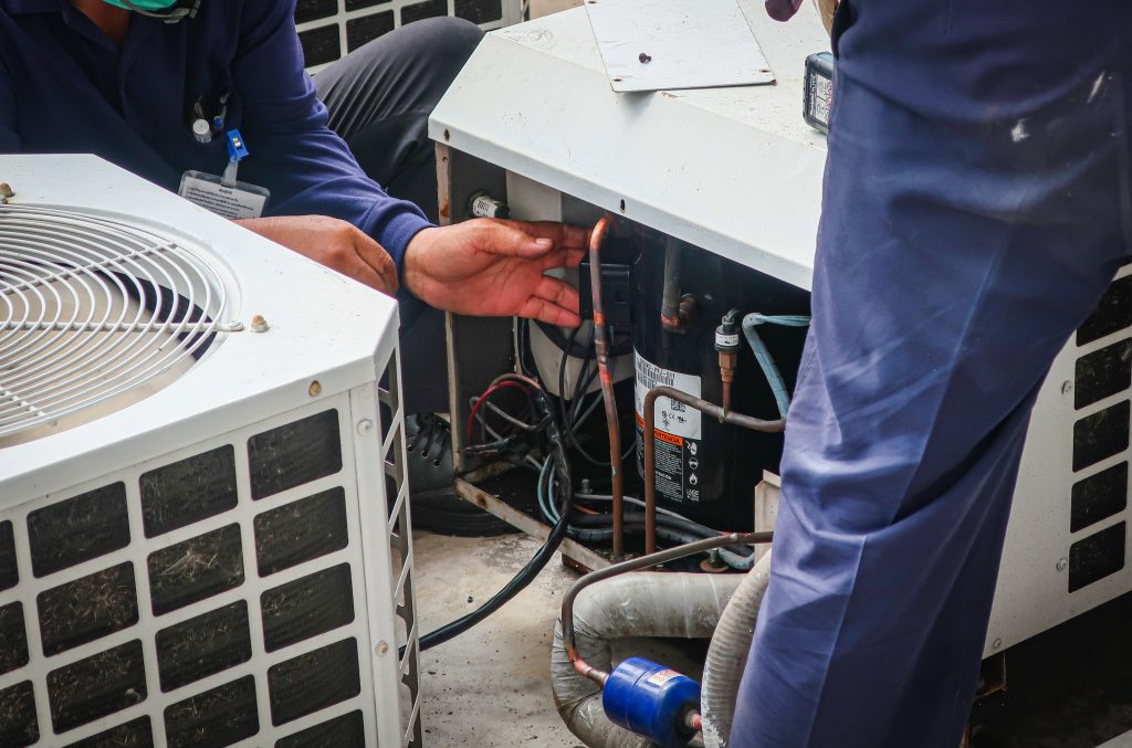 maintenance-man-repair-air-conditional-and-air-com-2026-01-07-23-54-29-utc